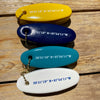 Yellow, blue, teal and white boat key fobs from the Fairhope store